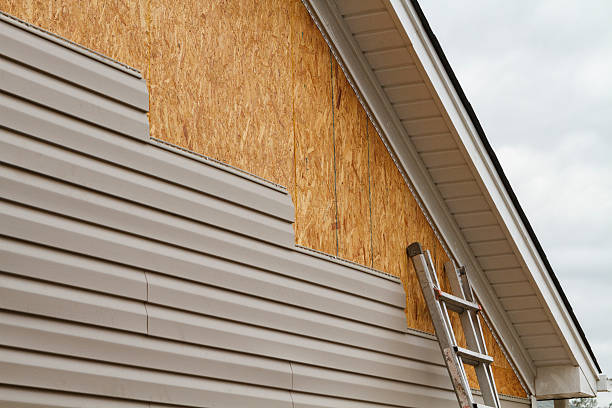 Professional Siding Replacement technician working in Springfield, CO